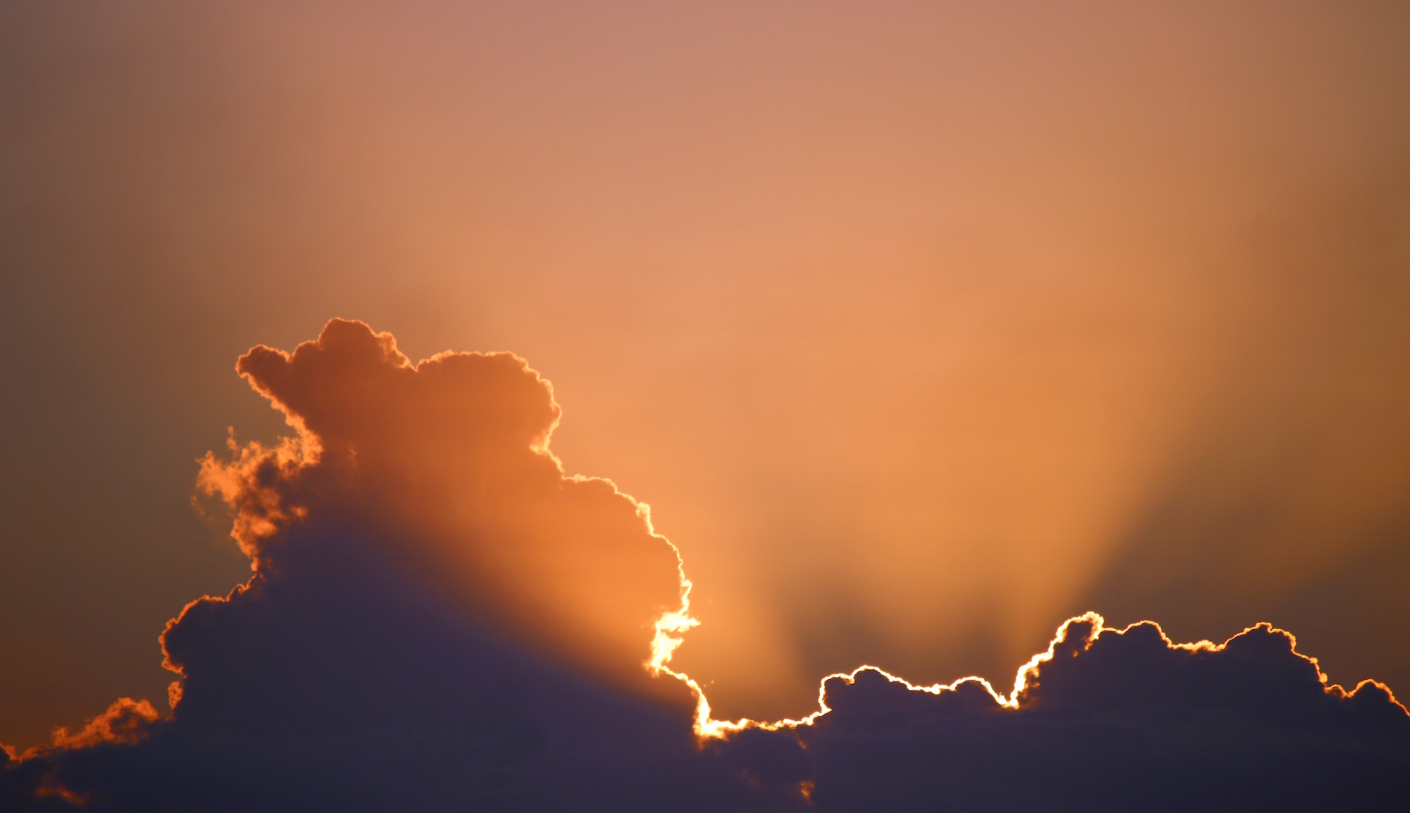 light shining out of dark clouds