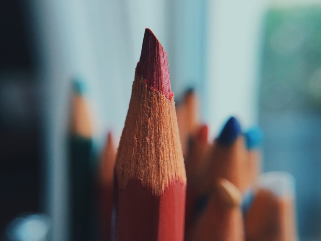 decorative image: sharp red pencil