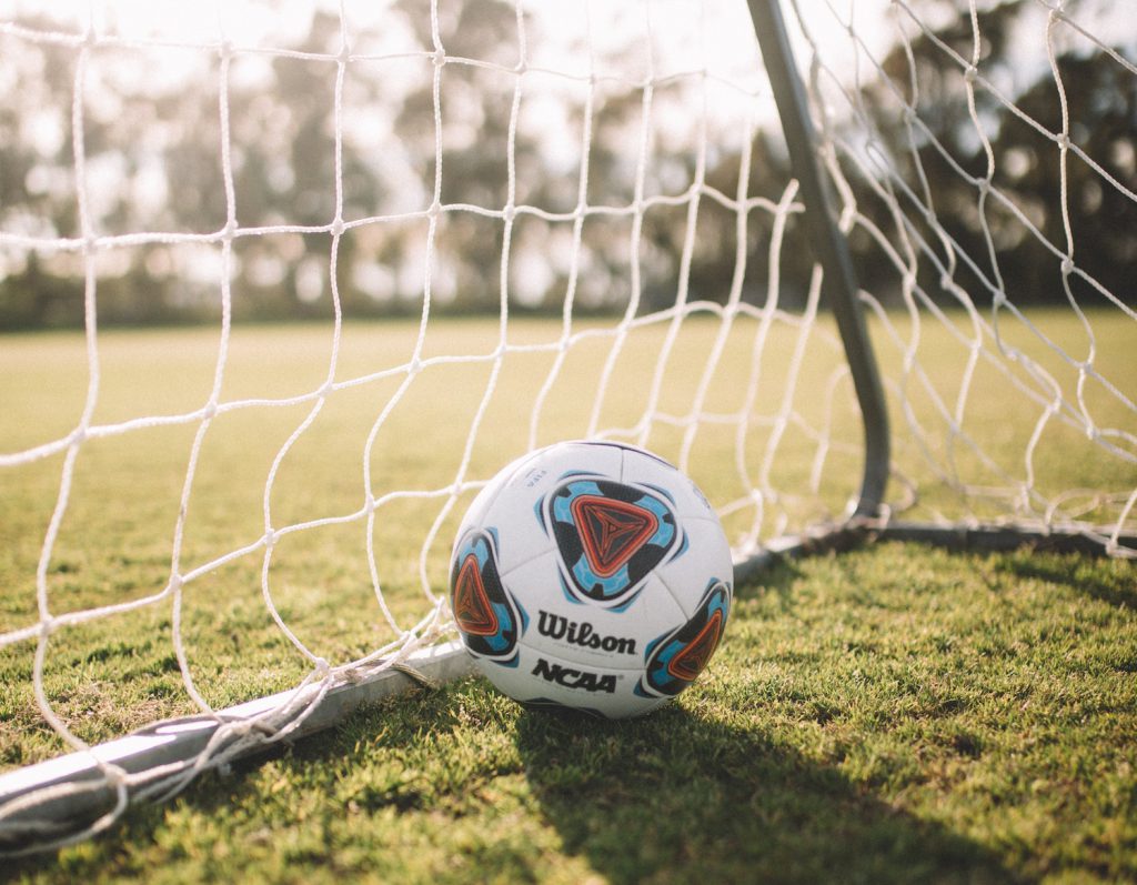 decorative image: soccer ball in goal