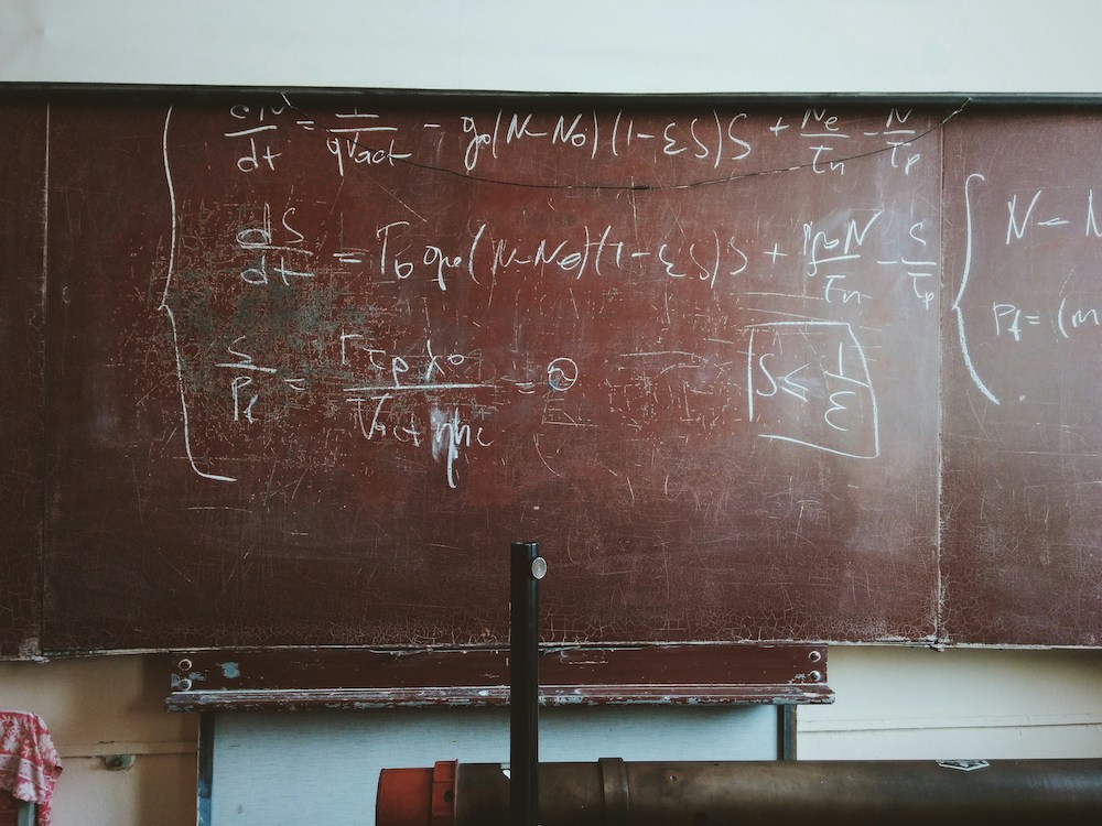 chalkboard with math on it